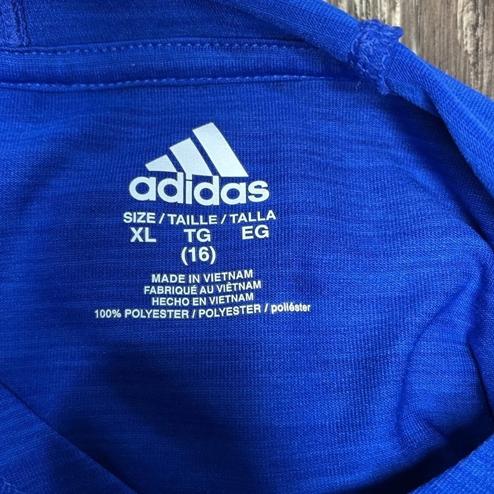 Girls royal blue adidas long sleeve shirt with a hood. Dri fit material size xl